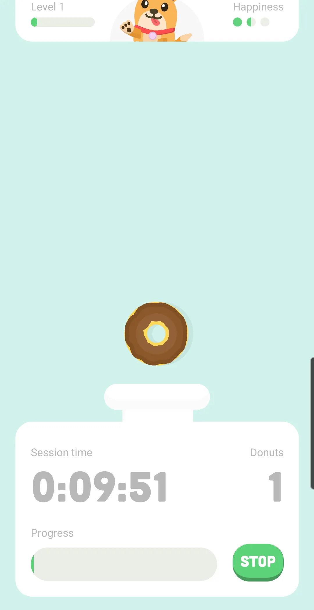 Focus Dog's session screen: the dog at the top edge, a donut above the machine, a session time of 0:09:51, a donut count of 1 and a Stop button